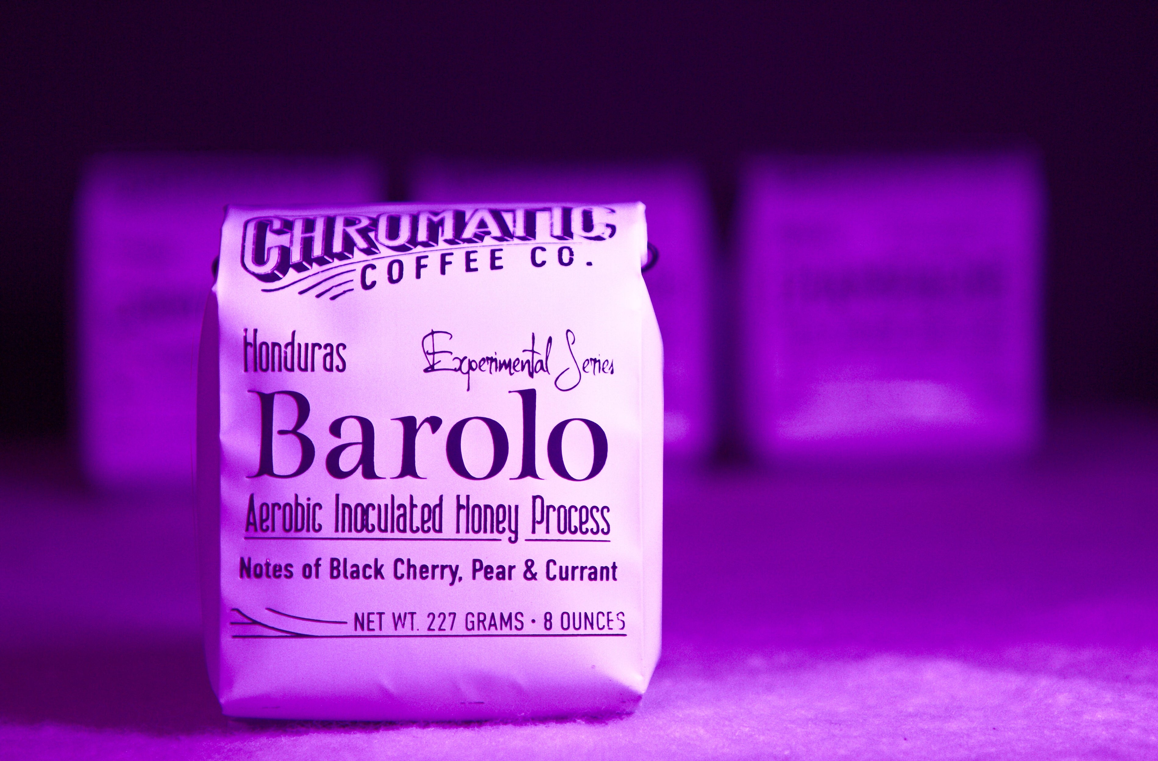 Coffee bag from Chromatic Coffee Co. with purple lighting